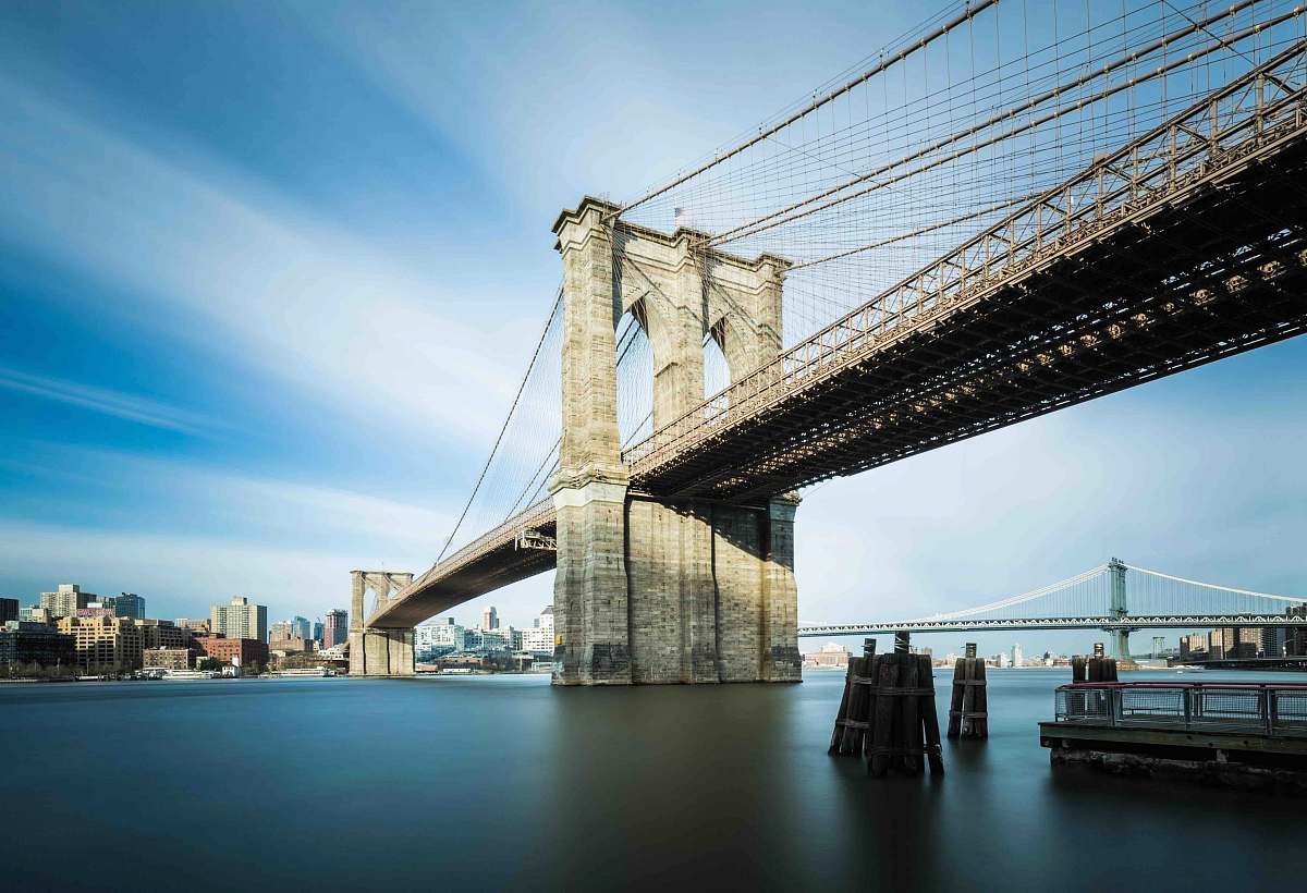 brooklyn bridge architectural photo of brown concrete bridge building